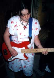 Sophie playing bass
